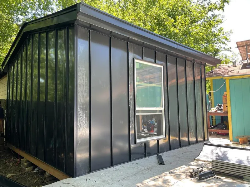 Black standing seam metal wall panels for Metal Roof Installation in Napoleon