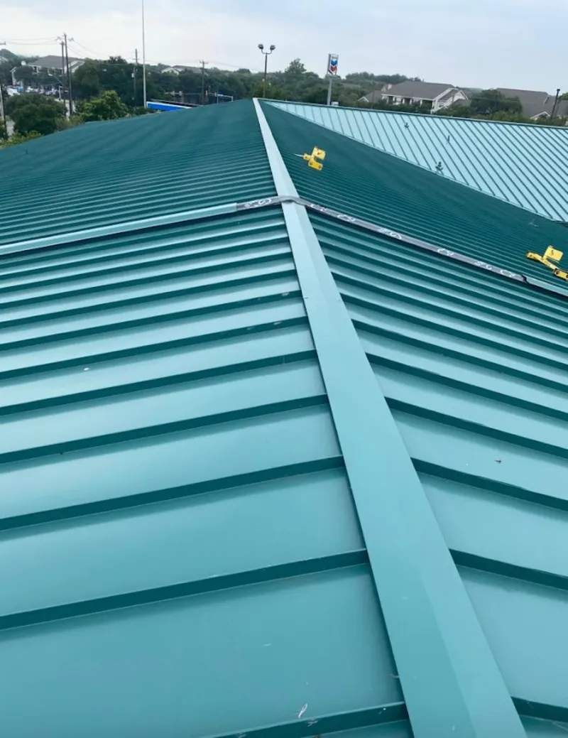 Green commercial metal roof ridge and valley for Metal Roof Repair in Napoleon